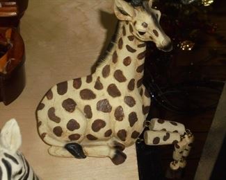 Cast giraffe & zebra decorations