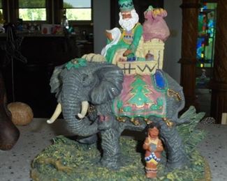 Gray cast Christmas elephant w/indian Santa