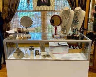 small size display or check out cabinet with storage in the back $150