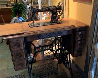 Singer machine in original cabinet