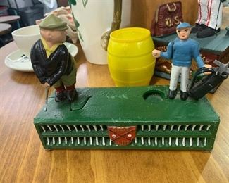 Cast iron golfers bank