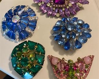 large selection of vintage rhinestone brooches