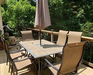 Tile top aluminum outdoor table with 6 chairs and umbrella