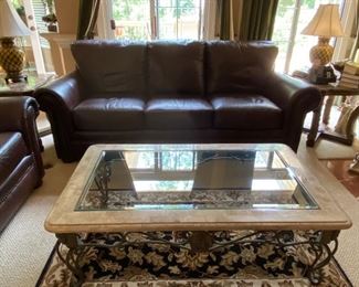 CraftMaster Leather sofa and glass and metal square coffee table