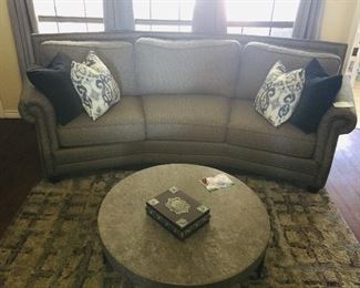 Curved sofa 
Grey curved sofa