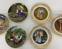 Six handsome 8" plates with paintings of fairy tales. Three are 1978 Franklin Porcelain with gold rims depicting Rapunzel, The Frog Prince and Rumplestilskin. Two are Kaiser from West Germany and numbered with designs of Puss & Boots and The Frog Prince. One is a numbered plate from Germany from 1981 and a painting of Rumplelstilskin by Charles Gehm. All are in excellent condition.