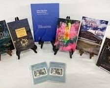 A variety of books on the subject of fairy tales from the collection of scholar, Jack Zipes. One, entitled Dark Shimmer, is signed by the author. This lot also includes 2 packs of illustrated postcards by Jack Zipes of selected fairy tales. Lovely for keepsakes or correspondence