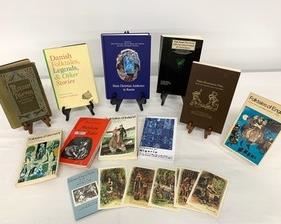 This lot of ten books on fairy tales are from around the world including Germany, Russia, Denmark, Mexico, Ireland, England, and Nigeria.

One of the books is Russian Folk Tales by Leonard Magnus published in 1916. This edition has some wear (see photo). This lot also includes one packet of illustrated postcards by Jack Zipes, scholar of fairy tales.