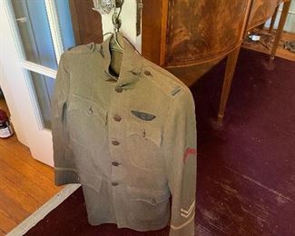 Military Uniform. WWI. Pilots uniform. With two hats, boots, logs, flags and pins, leather leg shin guards and photos.