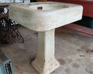 Cast iron porcelain sink! The pedestal shown here, along with a kitchen sink with a drainboard on each side, and a large basin to be hung on the wall.