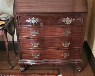 Serpentine front slant lid desk