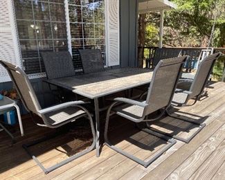 Nice tile top patio table and chairs