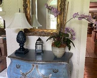 Very nice painted Bombay style chest, decor items and gold framed mirror.