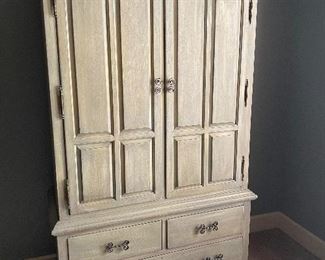 White washed wood armoire