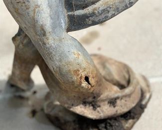 Small imperfection in back leg. 