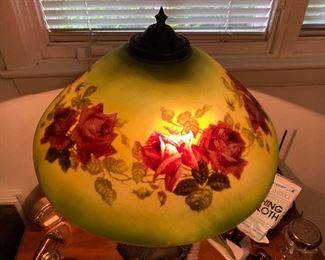 Reverse painted rose lamp on bronze base not signed