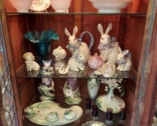 Many Fitz and Floyd porcelain pieces