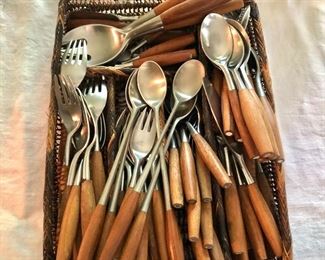 $750  - Vintage Dansk flatware set with wood handles.  79 pieces total   10 dinner forks, 15 salad forks, 14 soup spoons, 11 tea spoons, 5 iced tea spoons, 10 dinner knives, 10 butter knives, 3 serving forks, 1 ladle.  