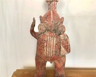 $250 Large clay figure with headdress (Mexico).  18.75" H, 6.5" W, 4" D.  