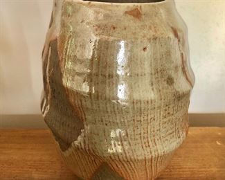 $50 - Pottery vase.  8.75" H, 5.75" diam. 