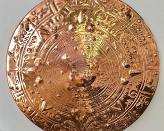 $35 Copper Aztec sun form.  10" diam.  