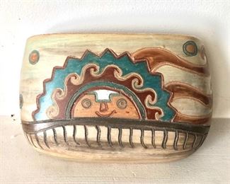 $40 - Pottery pouch with sun scene, stamped "Ceramicas Seminario, Peru".  5" H, 8.5" W, 3" D.  