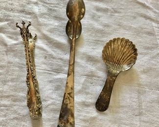 $25 each sterling silver tongs #1 and #2;  and shell spoon wine taster - Tong on left SOLD  5" L. Shell spoon on right SOLD 