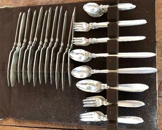 $3750 Georg Jensen Cactus pattern  67 piece sterling silver dessert and fruit plate set.  Set of 12 each except 7 medium sized spoons. Fish knives 7.75" long for scale.  