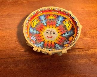 $35  Beaded gourd bowl sun design with border.  4" diam, 1.5" H. 