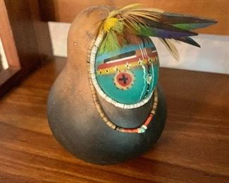 $40     Robert Rivera Gourd with Zuni mask and beads.  4.25" H, 3.5" diam.   As is missing nose