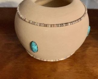$60  Signed and embellished stoneware bowl, as is (missing one turquoise stone).  3.75" H, 3.75" diam.