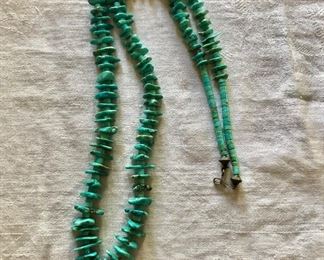 $175  Turquoise necklace graduated design.  30"L 