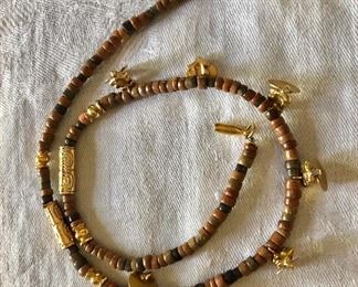 $40 Beaded necklace with gold tone accents.  18"L 
