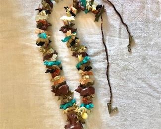 $325  - Chunky, large fetish necklace.   Necklace: 29"L.  Bear pendant: 1.8"L 