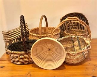 Overview each woven baskets.  Front left:  12" H, 10.5" L, 9.5" W.  