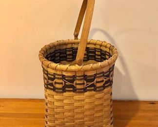 $75 Large basket with handle on legs.  14" H, 11.5" diam, handle drop 8".  