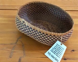 $75 Intricate woven basket with tag.   2.5" H, 7" L, 6" W.  