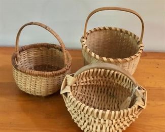 $25 Baskets with handles.  Each approx 5" H.  