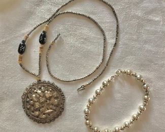 $35 each - Beaded necklace with medallion, silver beaded bracelet.   Left: necklace SOLD : 21"L; pendant: 2"diam.  Right: 7.5"L