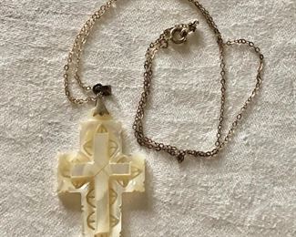$24 Mother of pearl cross pendant.  Chain: 19"L; Cross: 2"L; 1"W
