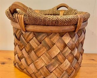 $35.  Woven basket with wood handles.  11" H, 12" diam.