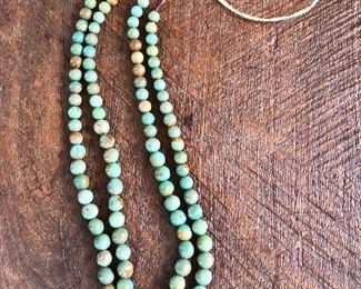 $240 Double stranded turquoise beaded necklace  30" L  (not including string) 