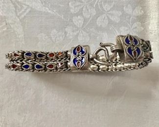 $60 Sterling silver enamel bracelet 7 and 3/4" Long 