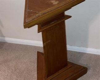 one of two triangular plant/display stands