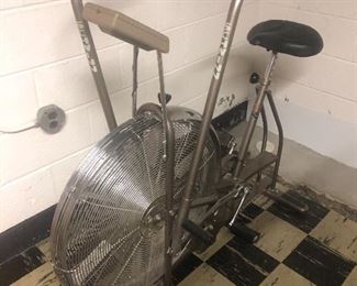 Stationary bike with arm bars