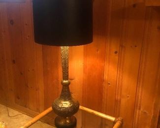 Side table (rattan) and large brass lamp with black shade