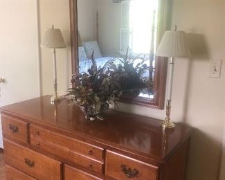 7-drawer dresser, mirror, buffet lamps and silk floral arrangement