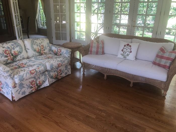 Upholstered 2-cushion loveseat, wicker 2-cushion couch and round wicker side table