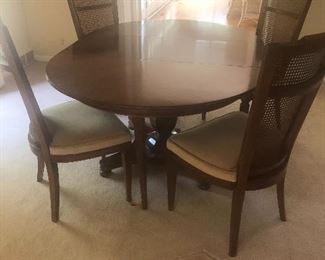 Dining table with 2 leaves and cane-back chairs (4 side and 2 armchairs) - simple and clean lines