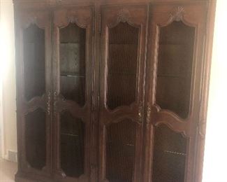 Wall unit/curio cabinet with interior shelves